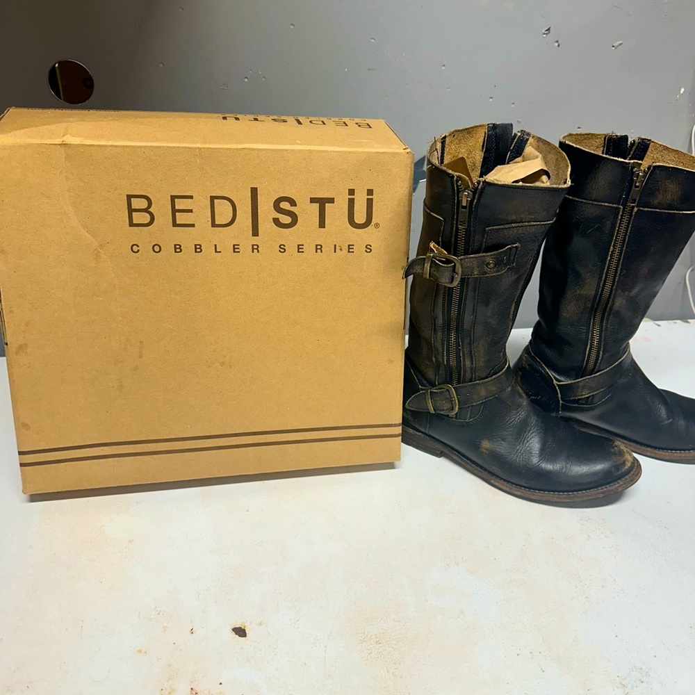 Women’s size 9 mid calf distressed boots